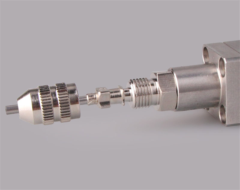 dispensing valve tip adapter